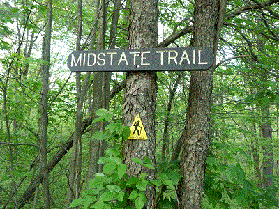 Sign for Midstate Trail on a tree